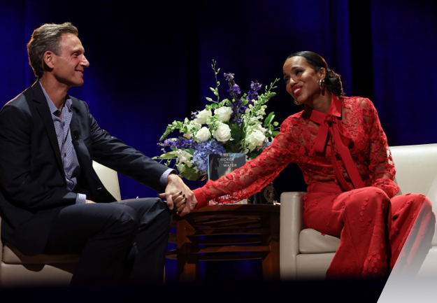 Kerry Washington extends a hand to Tony Goldwyn while in conversation on stage