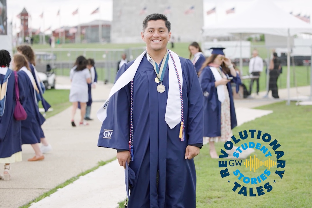 Reggie Jaramillo in regalia at GW Commencement on the National Mall