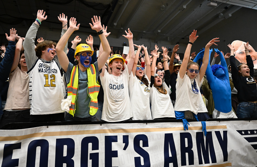 The George's Army student section cheers at a GW basketball game
